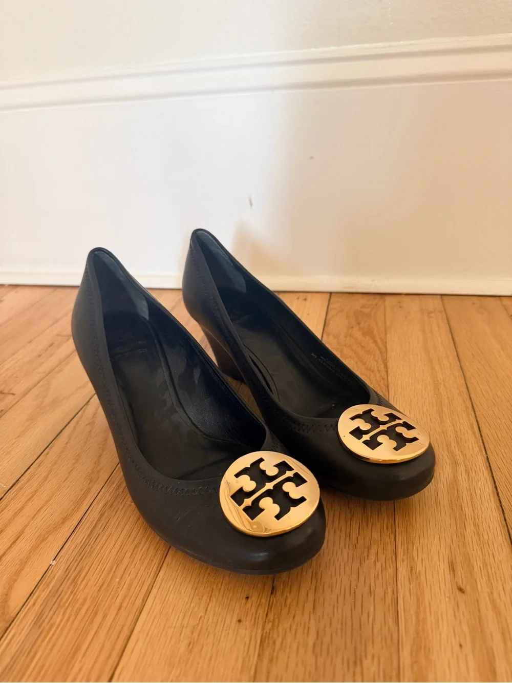 Tory Burch Black Leather Wedges with Gold Logo Medallions